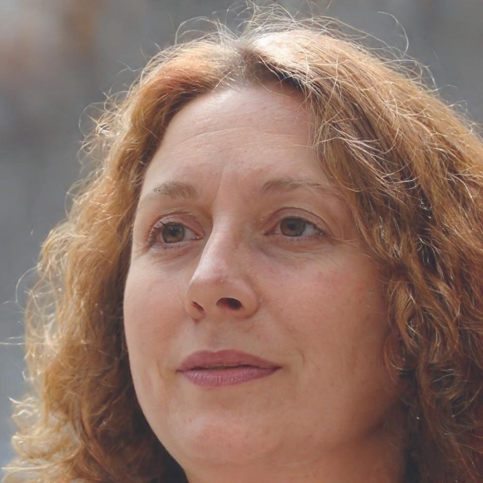 Professional woman providing testimonial about finance program success